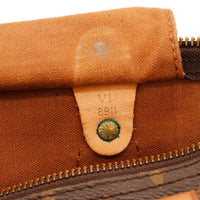 Détail date code VI 8911 et rivet vert-de-gris languette cadenas Louis Vuitton Speedy 30 — AMANA Vintage