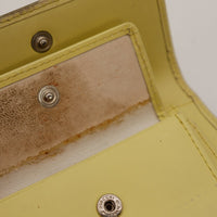 Detail intérieur poche monnaie portefeuille Courrèges taches visibles — AMANA Vintage