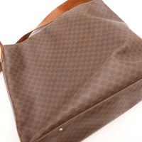 Détail toile Macadam Celine close-up motif C entrelacés marron — AMANA Vintage