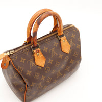 Détail anses Louis Vuitton Speedy 25 cuir vachette assombri usage — AMANA Vintage