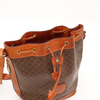 Détail intérieur ouvert sac seau Céline Macadam oeillets vert-de-gris — AMANA Vintage