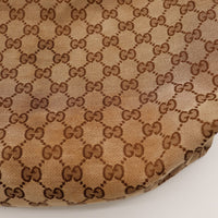 Gros plan canvas GG Gucci Hobo Horsebit occasion authentique — AMANA Vintage