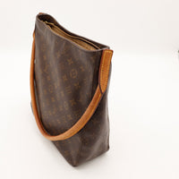 Louis Vuitton Looping GM vue côté anse vachette cuir assombri — AMANA Vintage