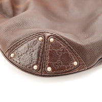 Détail coin Guccissima Gucci Hobo Bamboo marron clous dorés — AMANA Vintage