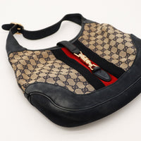 Vue dessous Gucci New Jackie cuir noir toile monogrammée broderies — AMANA Vintage