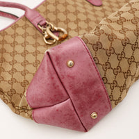 Detail coin inferieur gauche cuir bordeaux use Tote Bag Gucci — AMANA Vintage