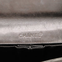 Détail coin inférieur frottements sac Chanel Travel Line nylon noir — AMANA Vintage