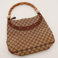 Vue à plat Gucci Hobo Bambou toile monogrammée et cuir marron — AMANA Vintage