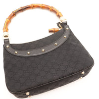 Détail vue plongeante Hobo Bambou Gucci clous dorés tirette bambou — AMANA Vintage