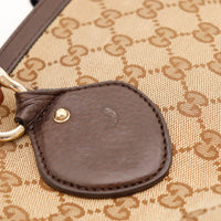 Détail tab en cuir grainé marron Tote Bag Bambou Gucci griffure légère — AMANA Vintage