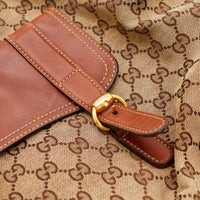 Détail boucle cuir et toile monogrammée Gucci — AMANA Vintage