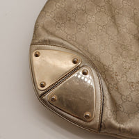 Gucci Indy Hobo détail coin plaque métallique usée frottements — AMANA Vintage