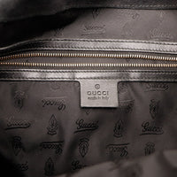 Détail intérieur poche zippée Gucci Indy Hobo étiquette made in Italy — AMANA Vintage
