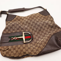 Détail fermoir Horsebit doré bande Web Gucci hobo vintage — AMANA Vintage