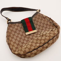 Vue à plat Hobo Web Gucci bande Web plaque dorée Gucci — AMANA Vintage
