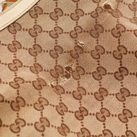 Détail accroc sur toile monogrammée Gucci Indy Hobo — AMANA Vintage