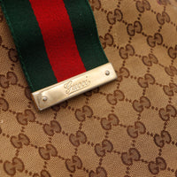 Détail plaque métal Gucci et bande Web rouge verte Hobo Web — AMANA Vintage