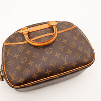 Détail anses et vachette Louis Vuitton Trouville patine caramel — AMANA Vintage