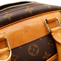 Détail double zip et cadenas Louis Vuitton Trouville — AMANA Vintage