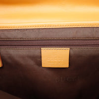 Intérieur sac Gucci Hobo doublure textile marron poche zippée étiquette cuir — AMANA Vintage