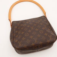 Détail anse vachette Louis Vuitton Looping MM patine caramel — AMANA Vintage