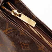 Détail zip intérieur Louis Vuitton Looping MM tirette dorée — AMANA Vintage