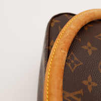 Gros plan anse vachette Louis Vuitton Looping MM traces de contact — AMANA Vintage