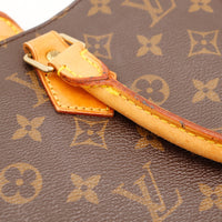 Détail attache anse vachette Sac Plat Louis Vuitton patine caramel — AMANA Vintage