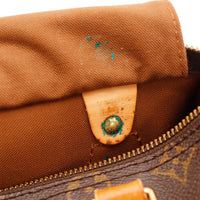 Détail intérieur Louis Vuitton Speedy 25 vert-de-gris rivet languette cadenas — AMANA Vintage