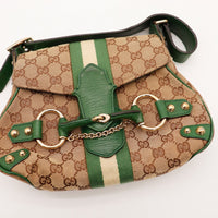 Détail mors doré Gucci Hobo Horsebit cuir vert occasion authentique — AMANA Vintage