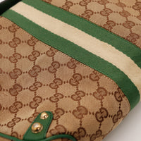 Détail toile monogrammée et bande Web Gucci Hobo Horsebit occasion authentique — AMANA Vintage