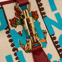 Détail fermoir piston doré Gucci Jackie 1961 Music Is Mine brillant sans usure — AMANA Vintage
