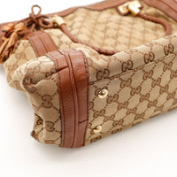 Détail coin et finition cuir Gucci Hobo occasion authentique — AMANA Vintage