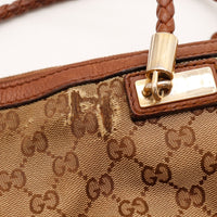 Détail usure de la toile près de la fixation d'anse Gucci Hobo — AMANA Vintage