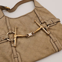 Détail mors doré Gucci Hobo Horsebit cuir taupe — AMANA Vintage