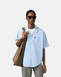 Chemise boxy bleue en coton manches courtes